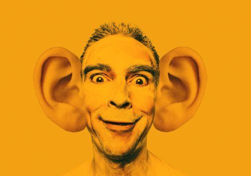 man-with-cartoonish-big-ears-illustrating-article-about-the-best-books-on-listening
