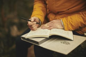 person doing stream of consciousness journaling
